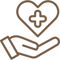 Hand holding heart with medical cross.